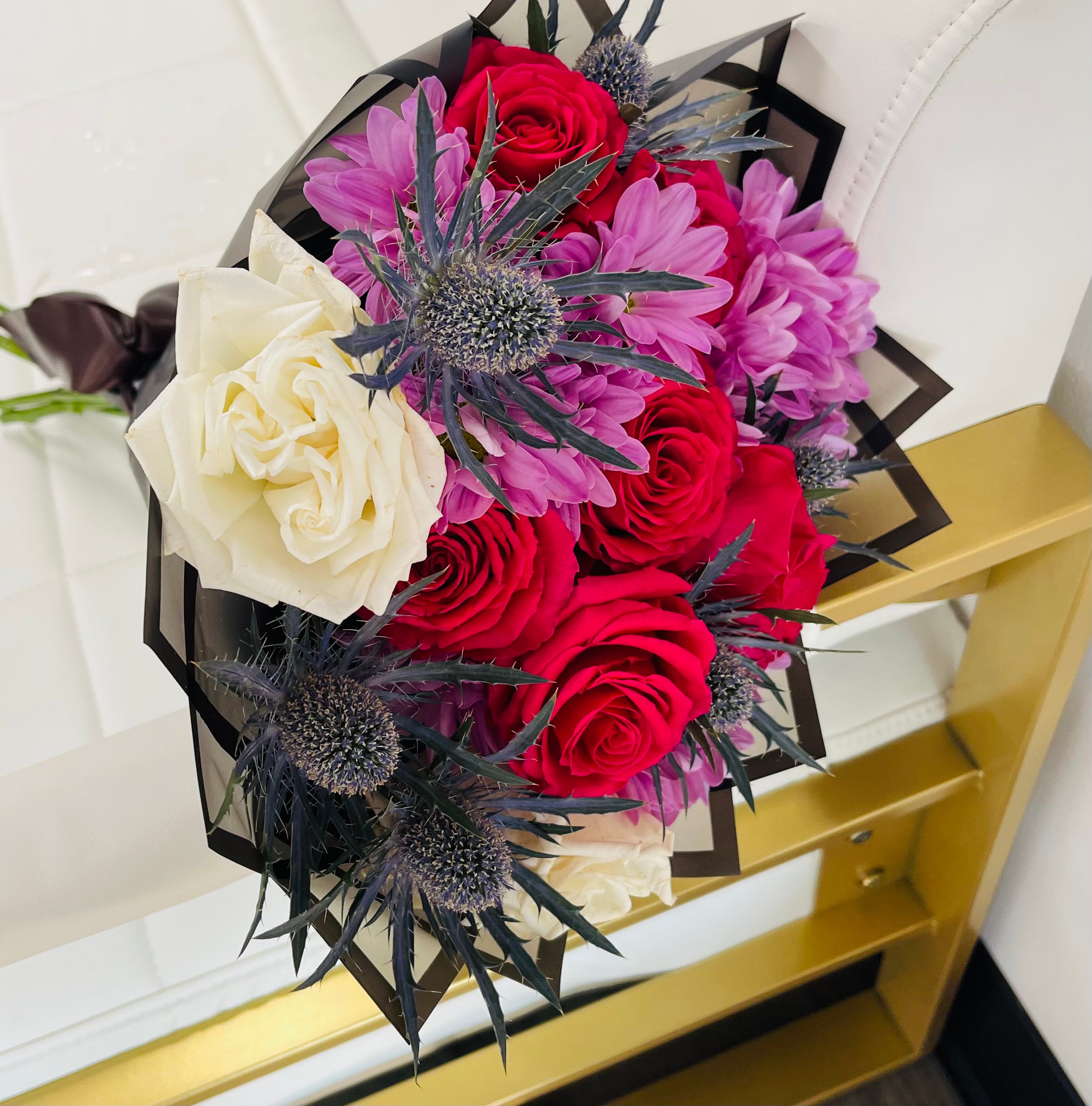 Mixed bouquet in black wrapping